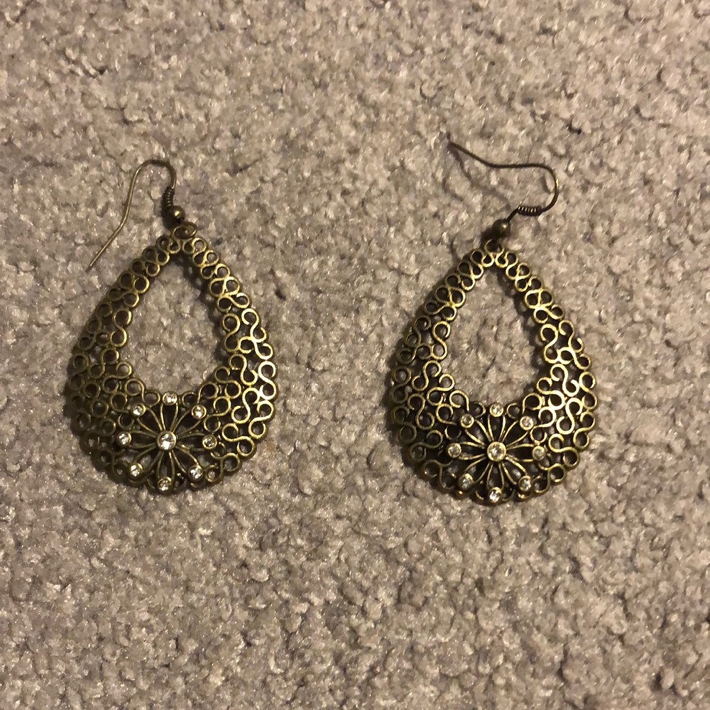 Copper colored handing earrings with stones